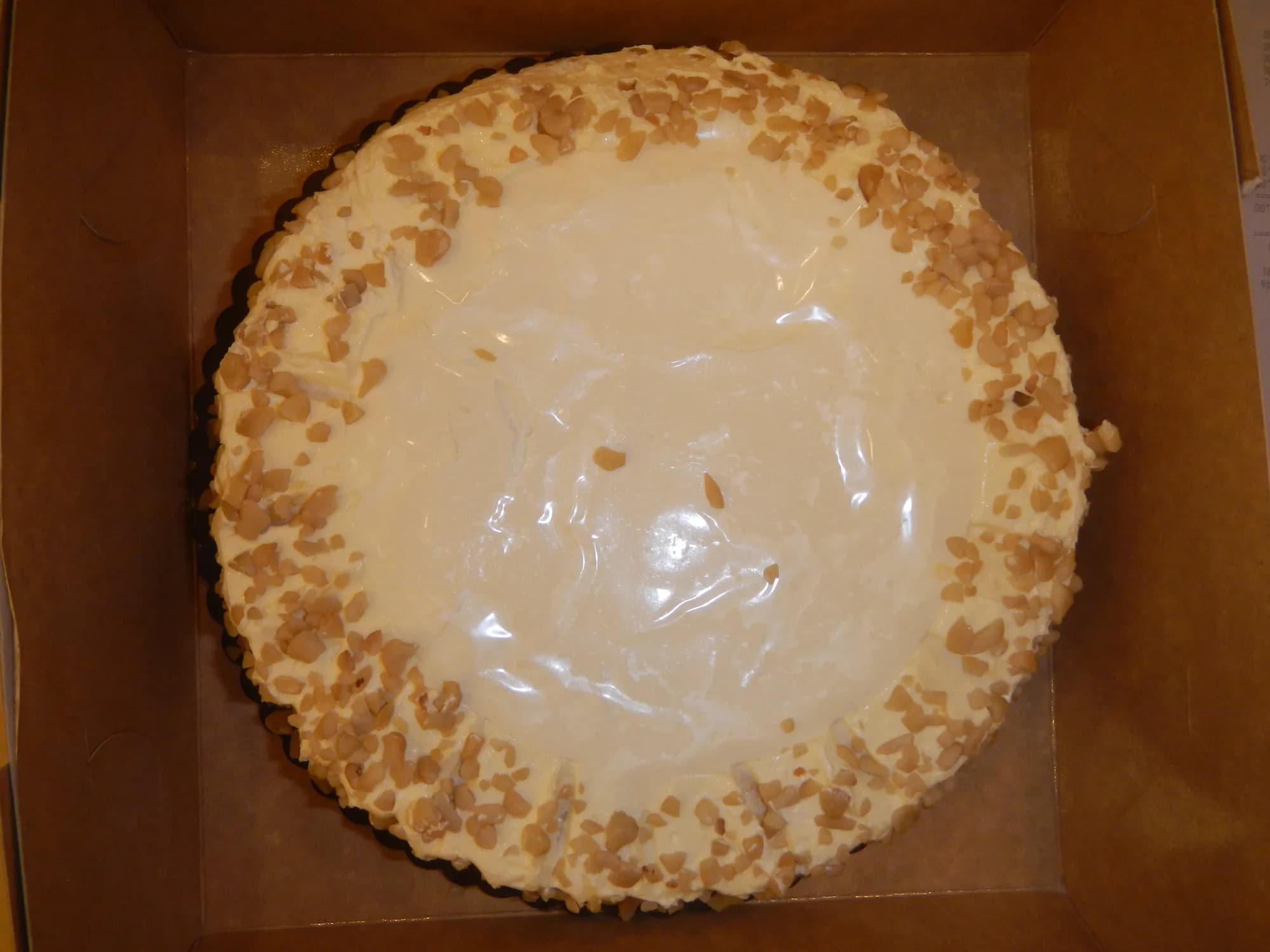 A whole sans rival cake topped with cashews (illustrative photo)