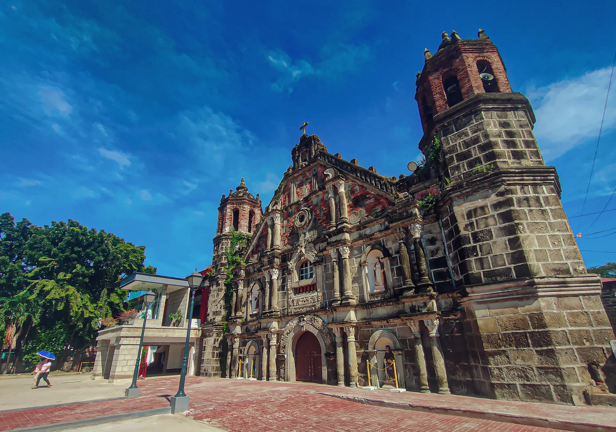 Baroque facade and bell tower of Santa Monica Parish Church, Minalin