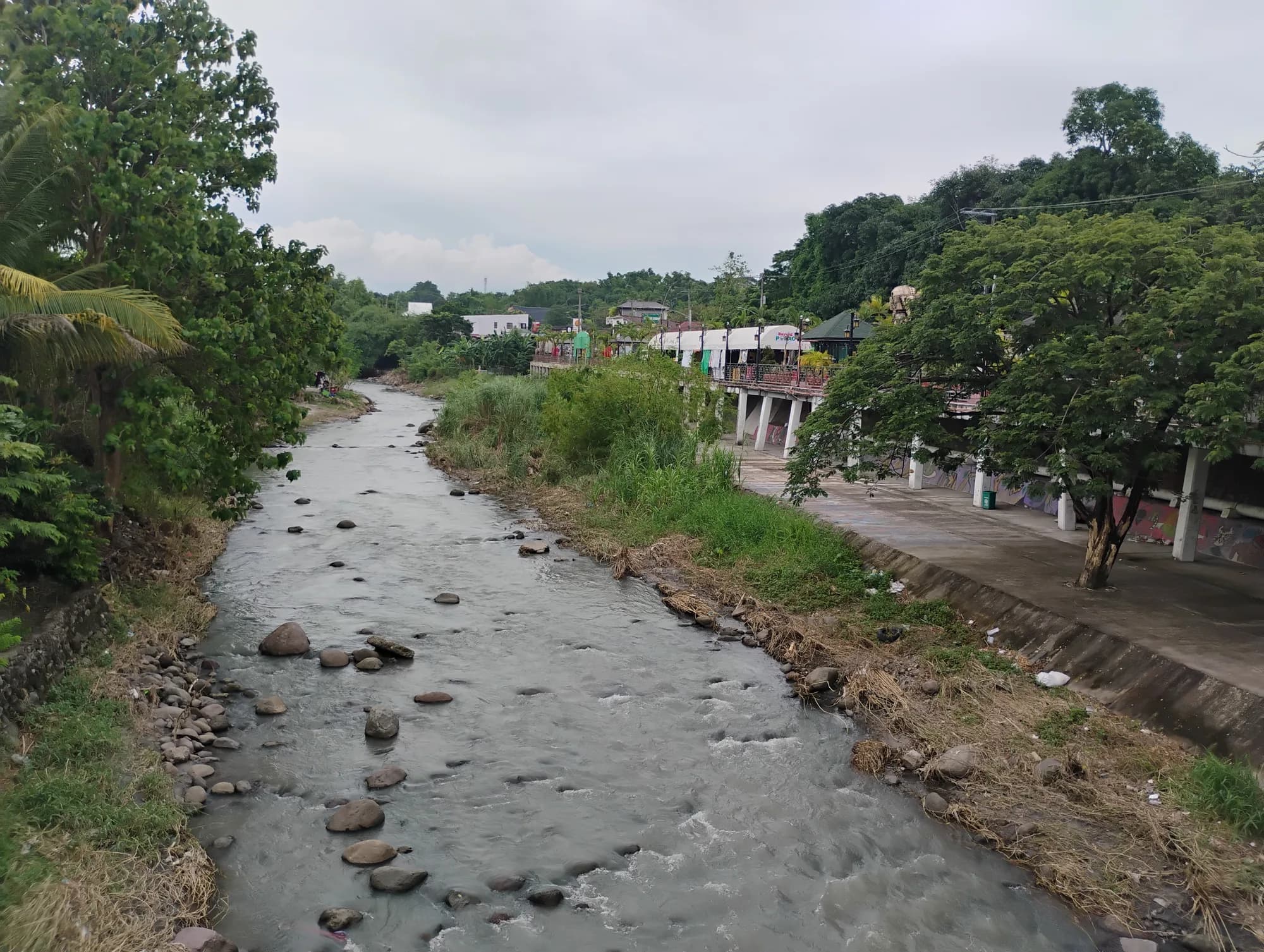 The rocky Porac River lined with trees (illustrative photo)