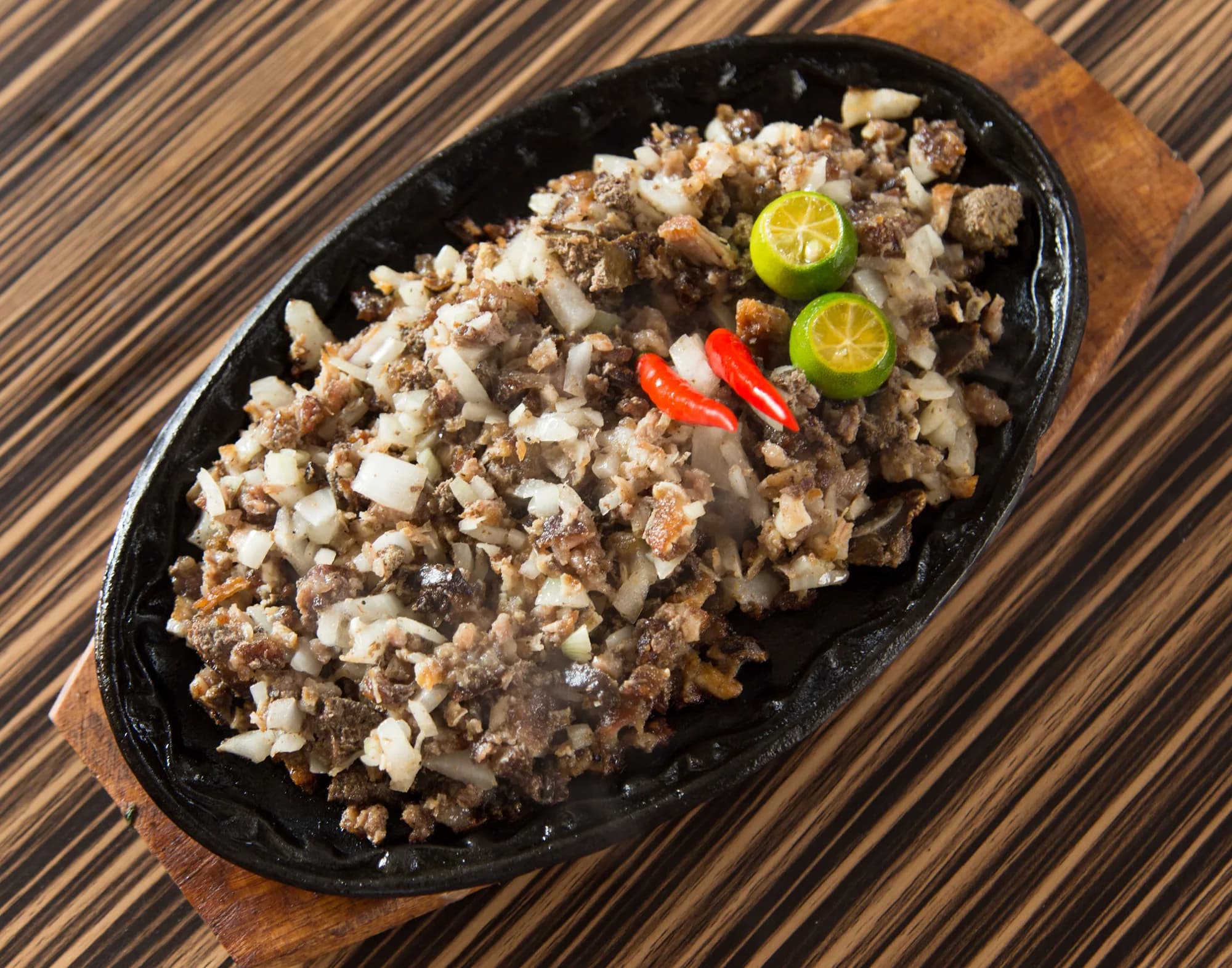 A sizzling plate of Kapampangan sisig (illustrative photo)