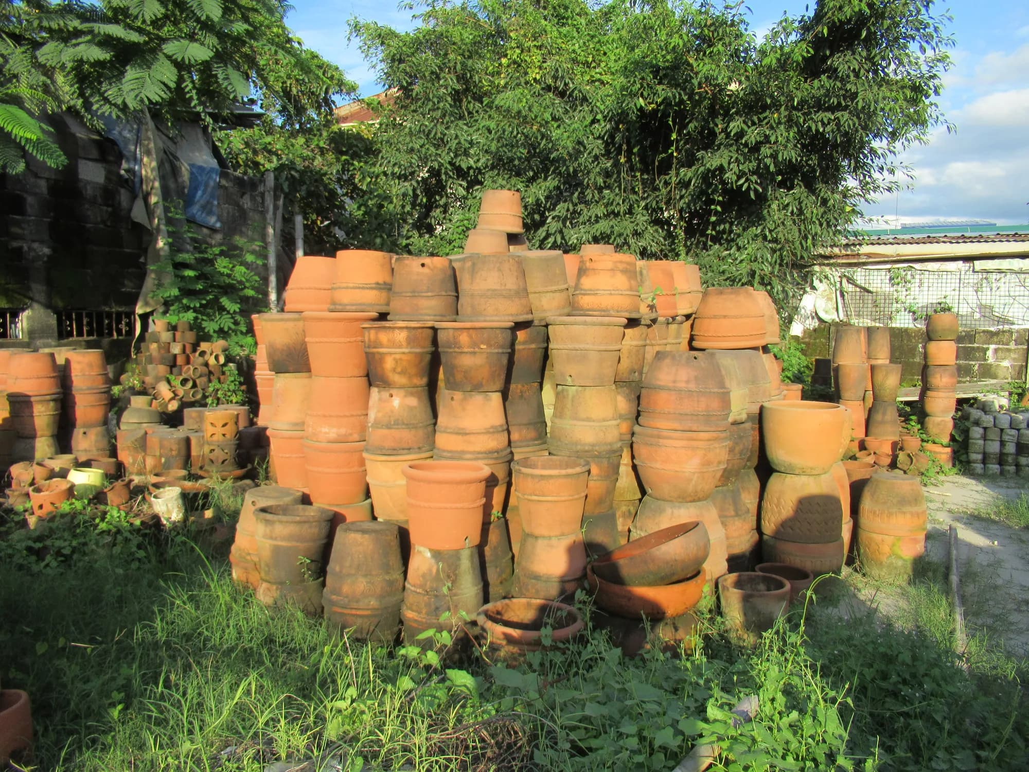 Stacks of clay pots in Santo Tomas, Pampanga