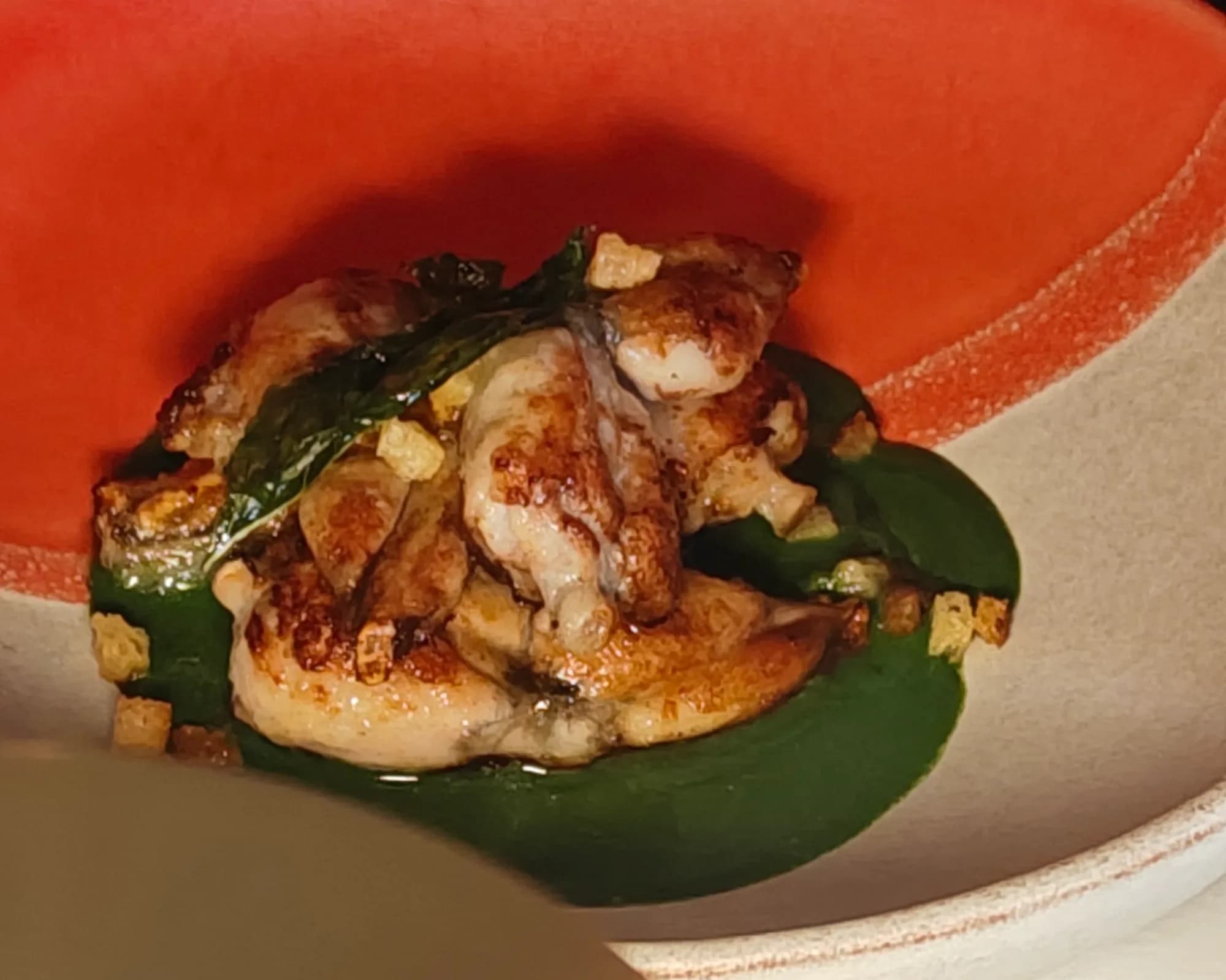 A plate of roasted frog legs (illustrative photo)