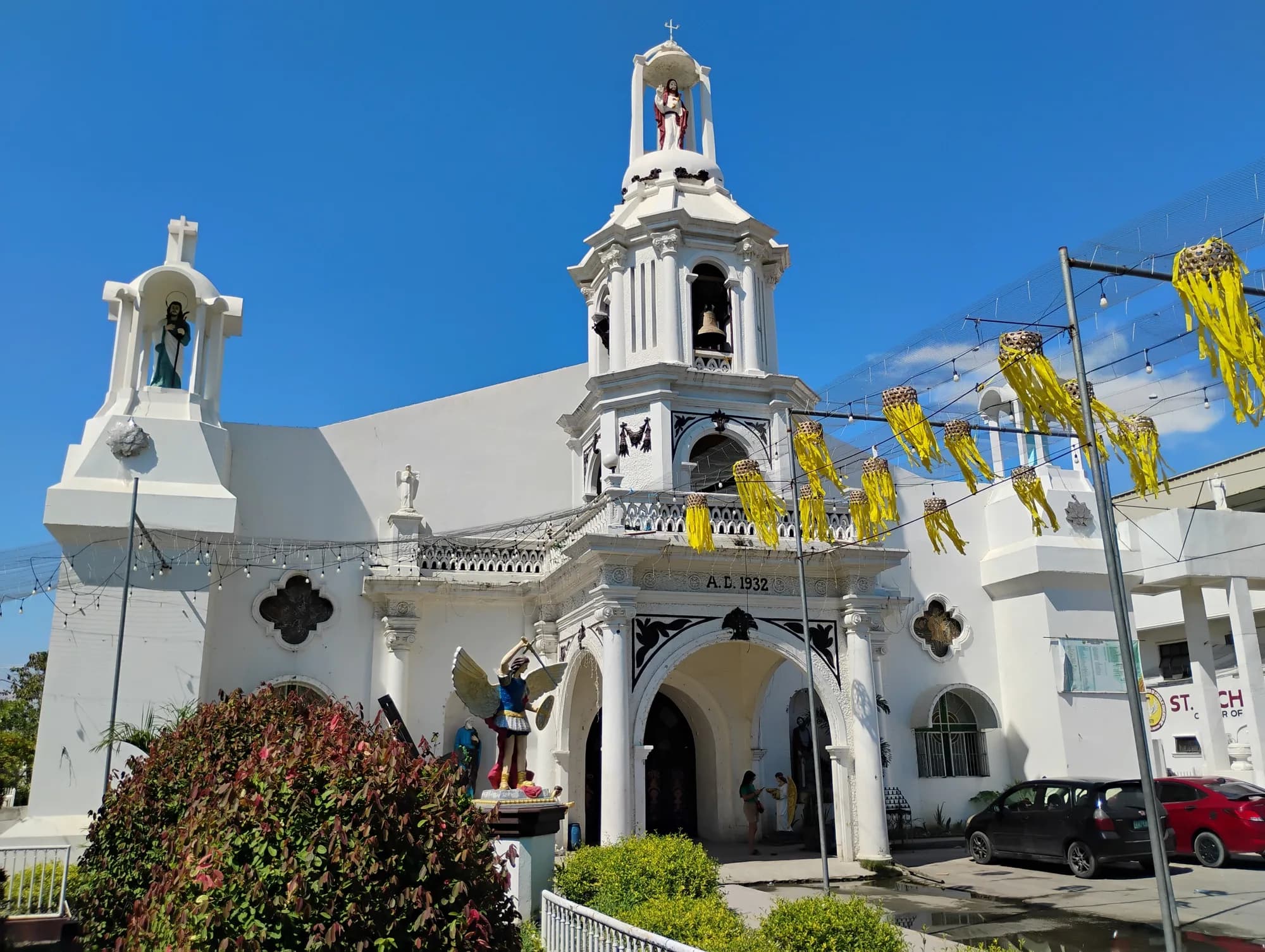 Facade of San Miguel Arcangel Parish Church in Masantol with its central bell tower