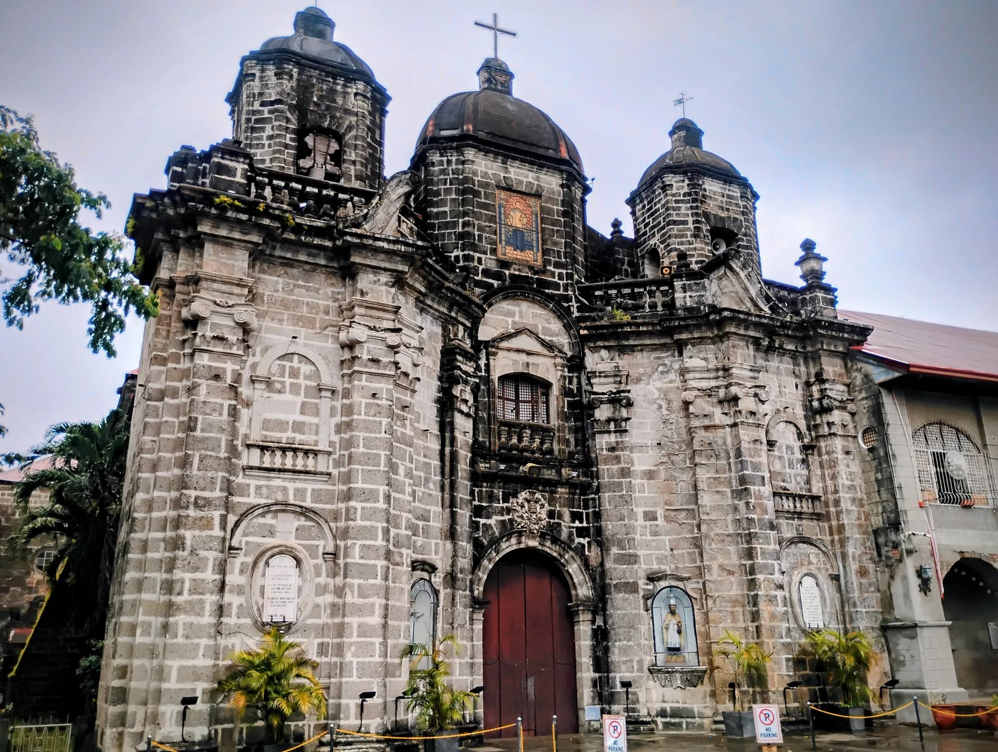 Ornate stone facade of San Luis Gonzaga Parish Church, San Luis