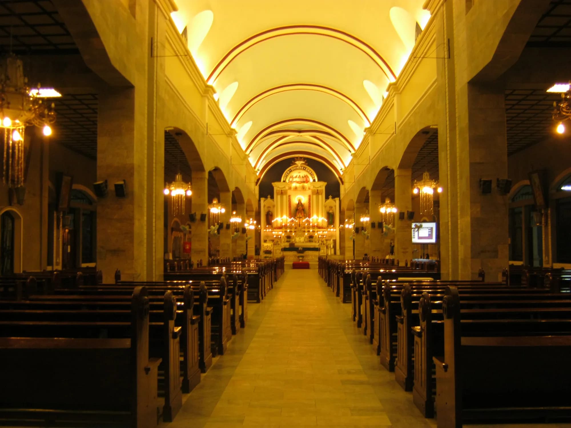 The golden interior of Our Lady of Grace Church, Mabalacat