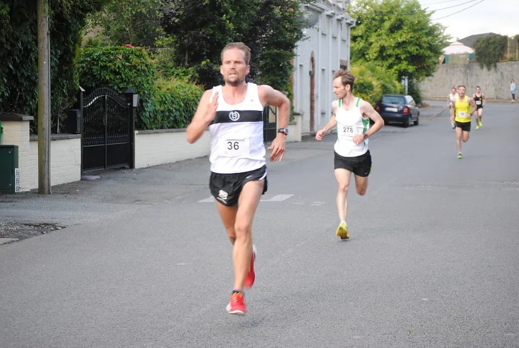 Runners crossing the finish line of a fun run (illustrative photo)