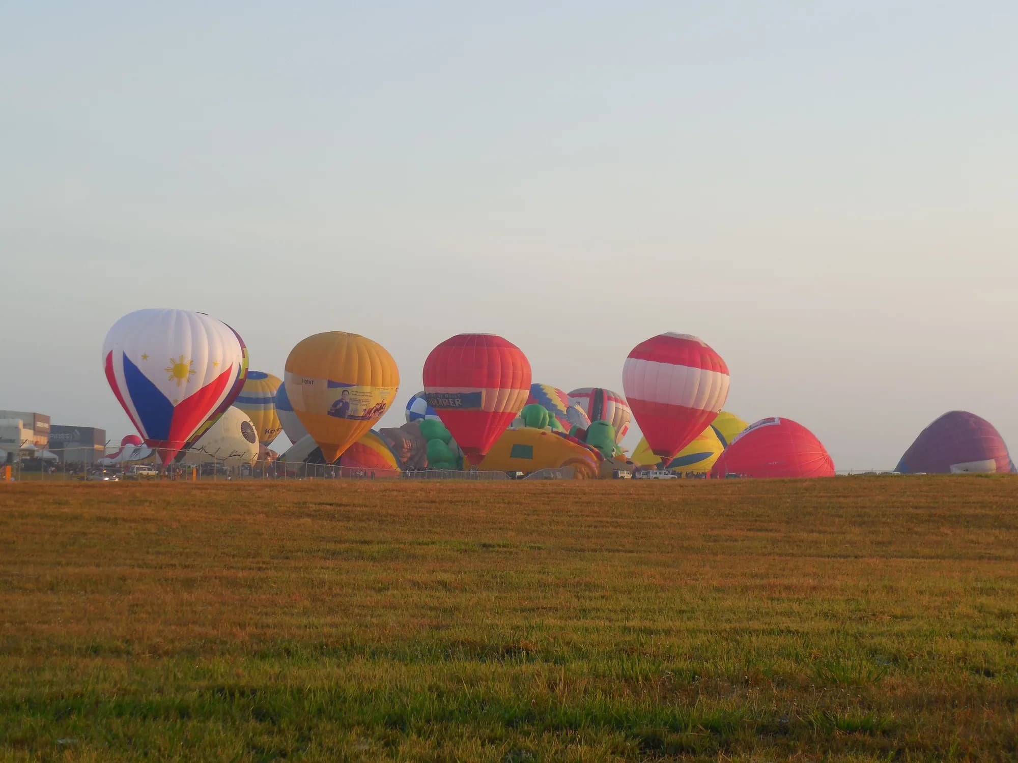 Hot air balloons inflating at dawn at the Philippine International Hot Air Balloon Fiesta (illustrative photo)