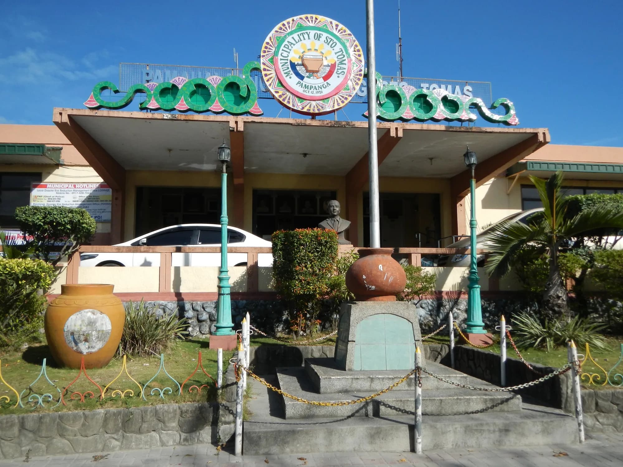 The Santo Tomas municipal hall with clay jars out front