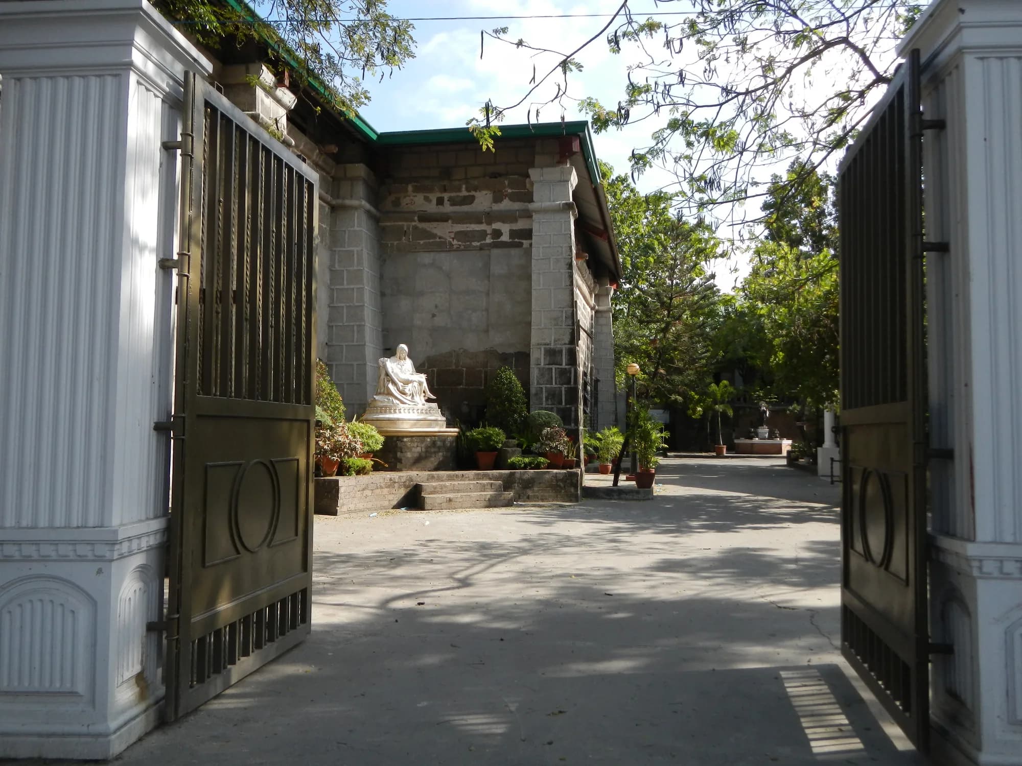 The rear entrance and patio of Minalin Church